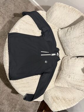 TaylorMade Black Men's Performance Half-Zip Jacket with White Zip Accents